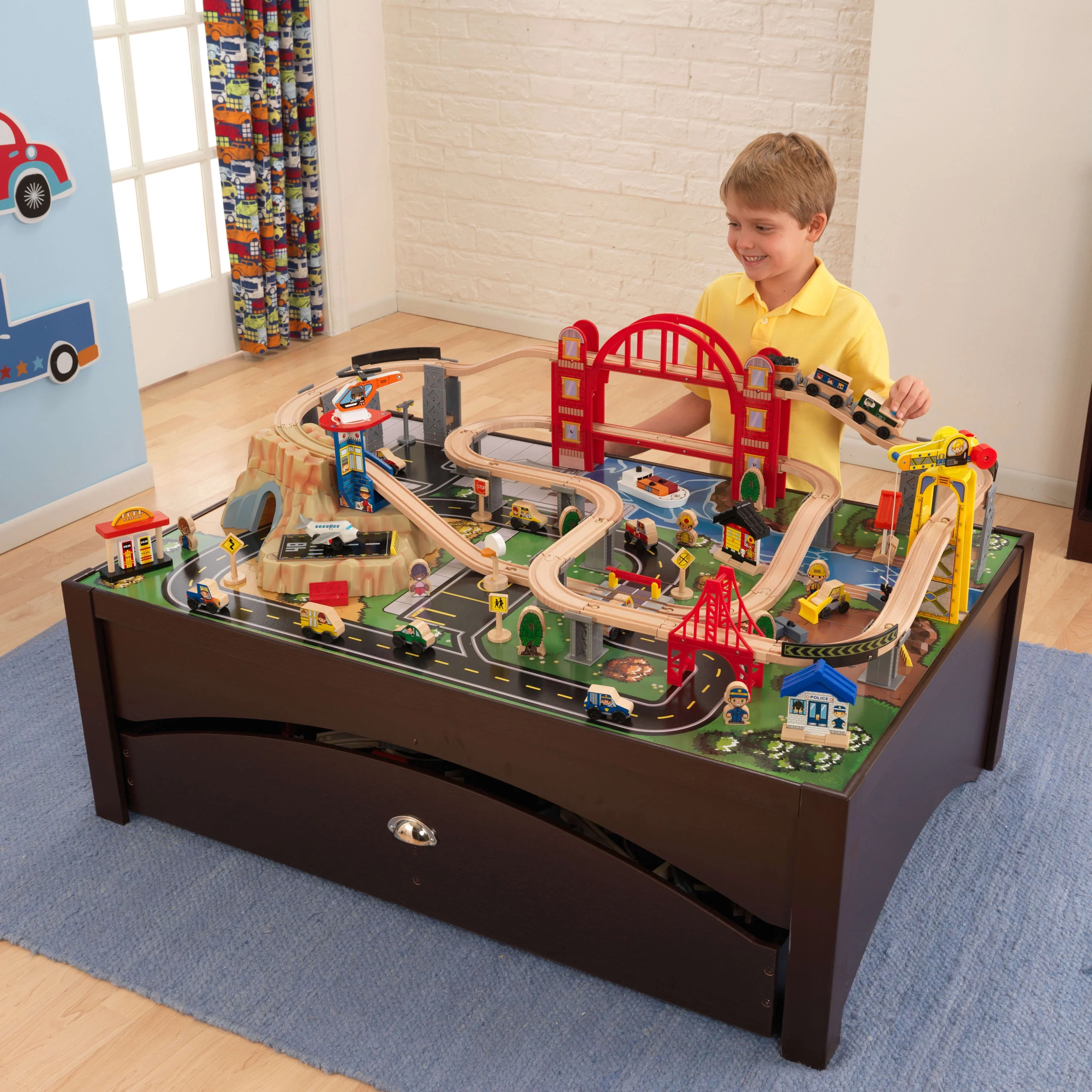 KidKraft Metropolis Wooden Train Set and Train Table with 100 Accessories