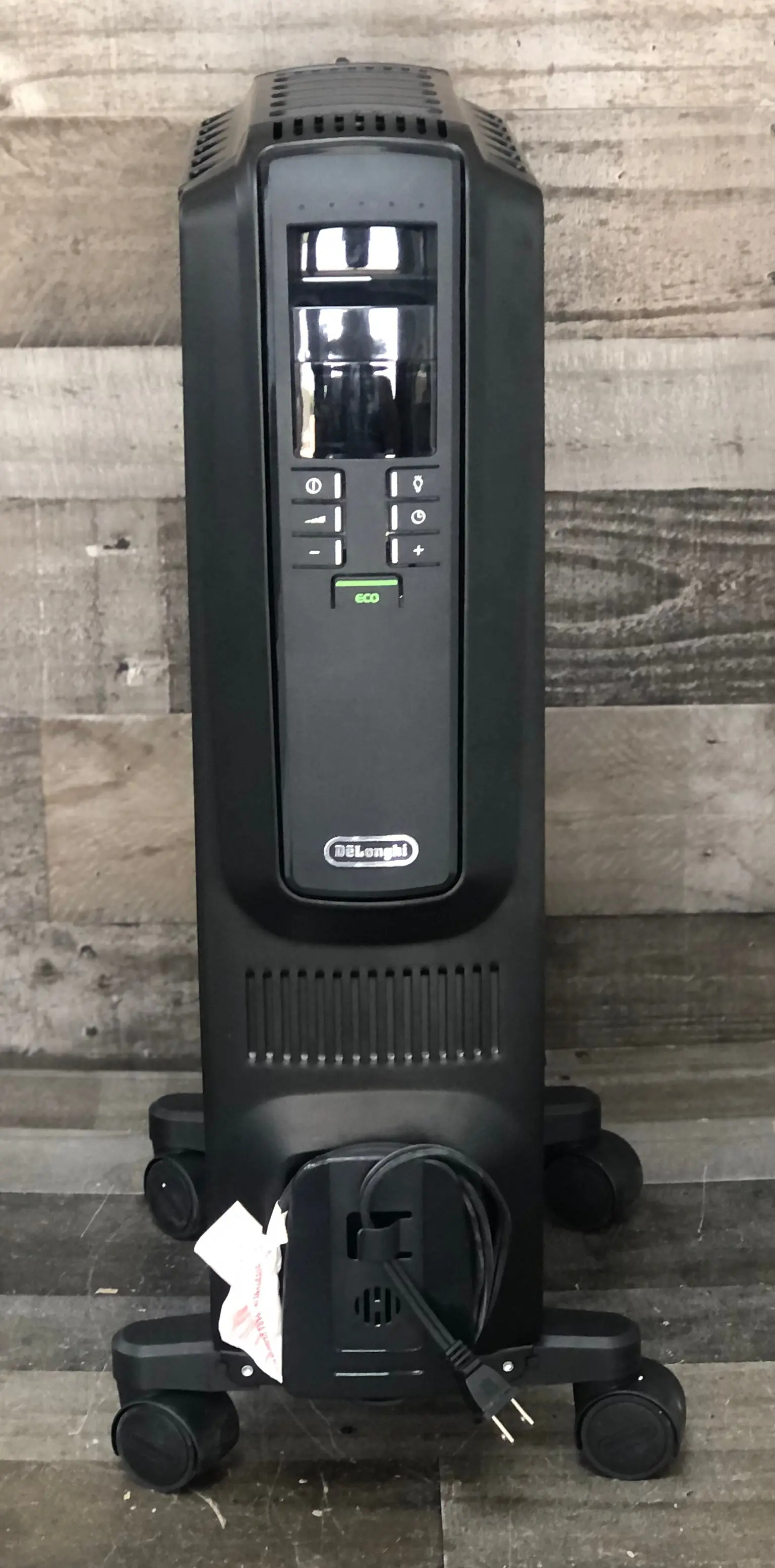 De'Longhi Oil-Filled Radiator Space Heater, Quiet 1500W, Adjustable Thermostat, 3 Heat Settings, Timer, Energy Saving, Safety Features, White, Dragon TRD40615EBKCA, Black