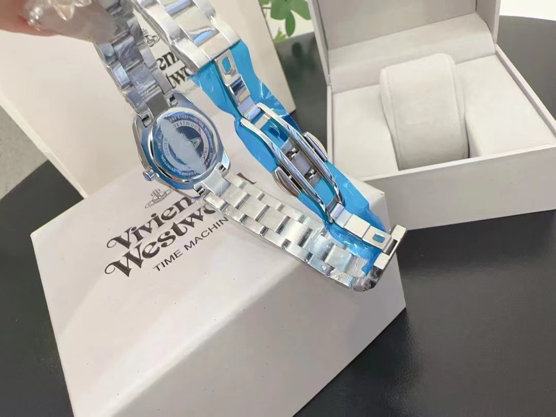 Replica Vivienne Westwood Light Blue Dial Silver Band Saturn Watch - 28MM