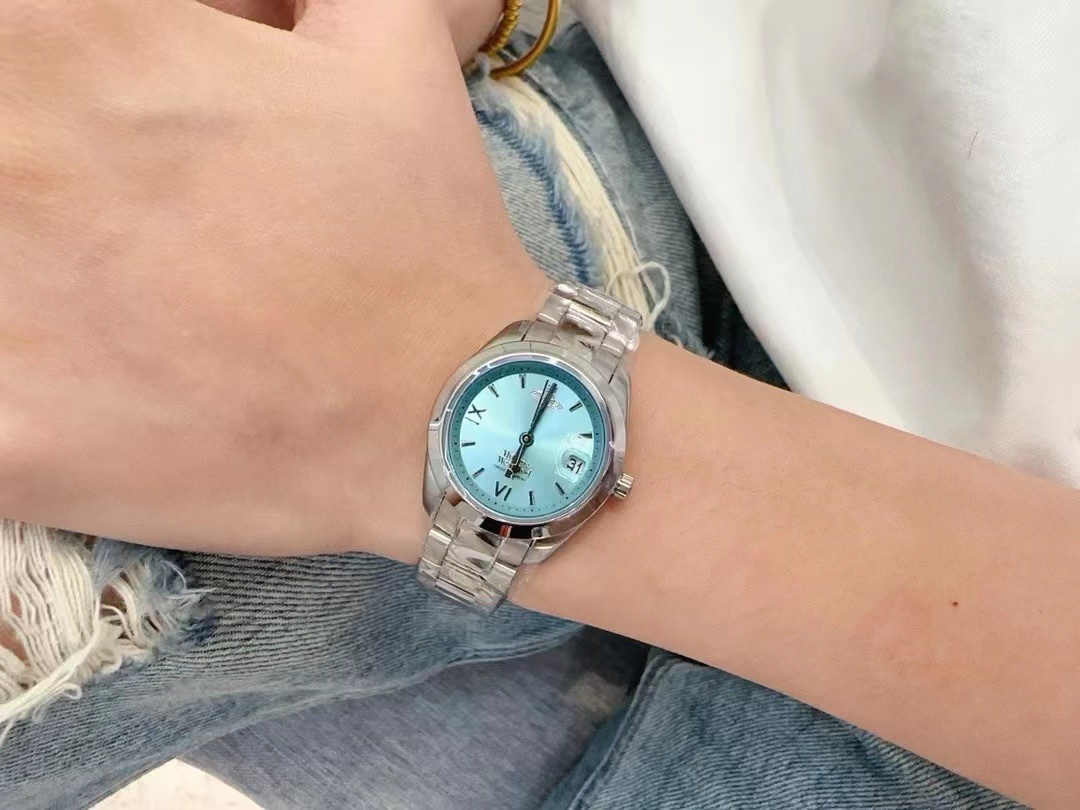 Replica Vivienne Westwood Light Blue Dial Silver Band Saturn Watch - 28MM