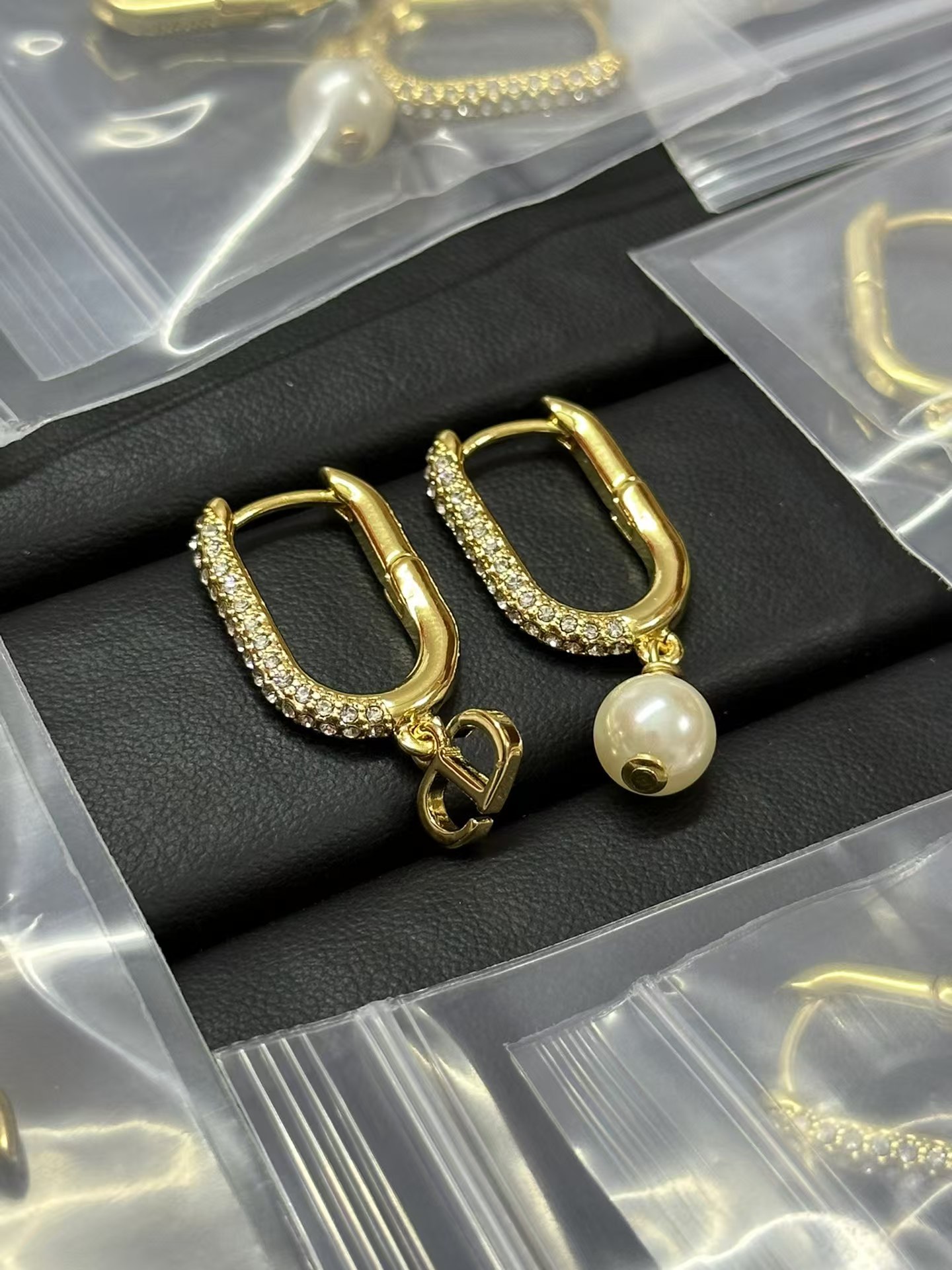 Replica Dior Asymmetric Charms Hinged Earrings