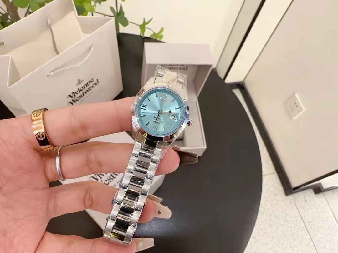 Replica Vivienne Westwood Light Blue Dial Silver Band Saturn Watch - 28MM