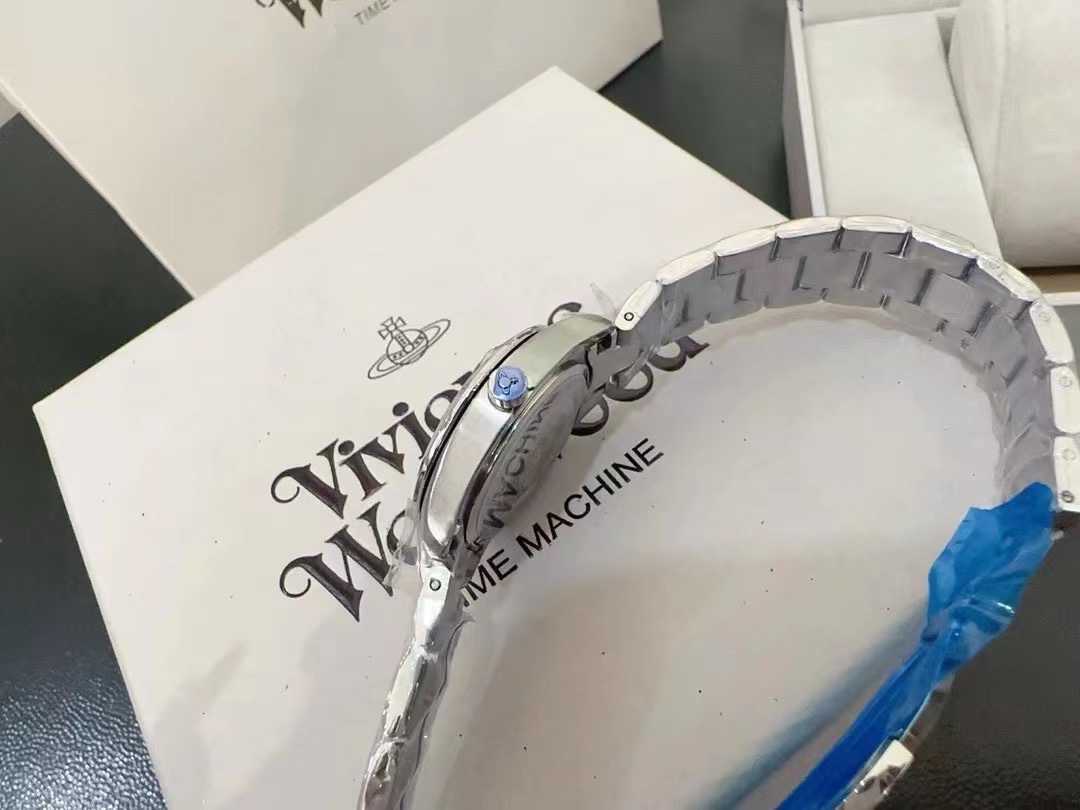 Replica Vivienne Westwood Light Blue Dial Silver Band Saturn Watch - 28MM