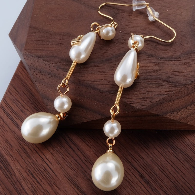 Replica Vivienne Westwood Teardrop Pearl Saturn Earrings