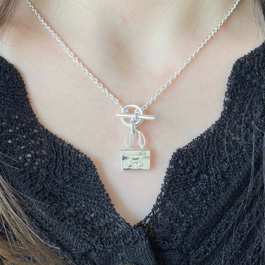 Replica Hermes OT Clasp Plain Surface Bag Pendant Necklace