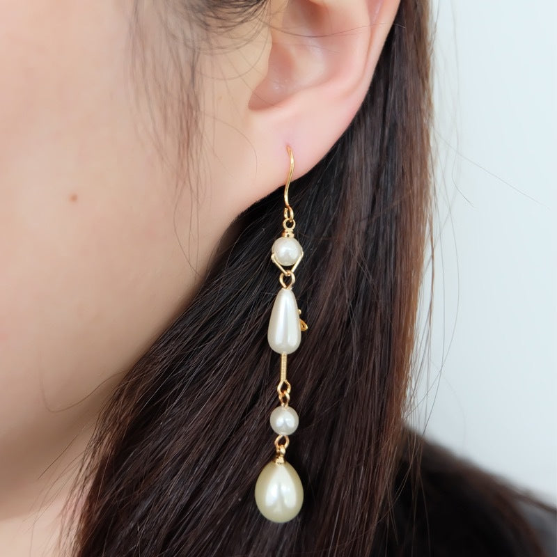 Replica Vivienne Westwood Teardrop Pearl Saturn Earrings