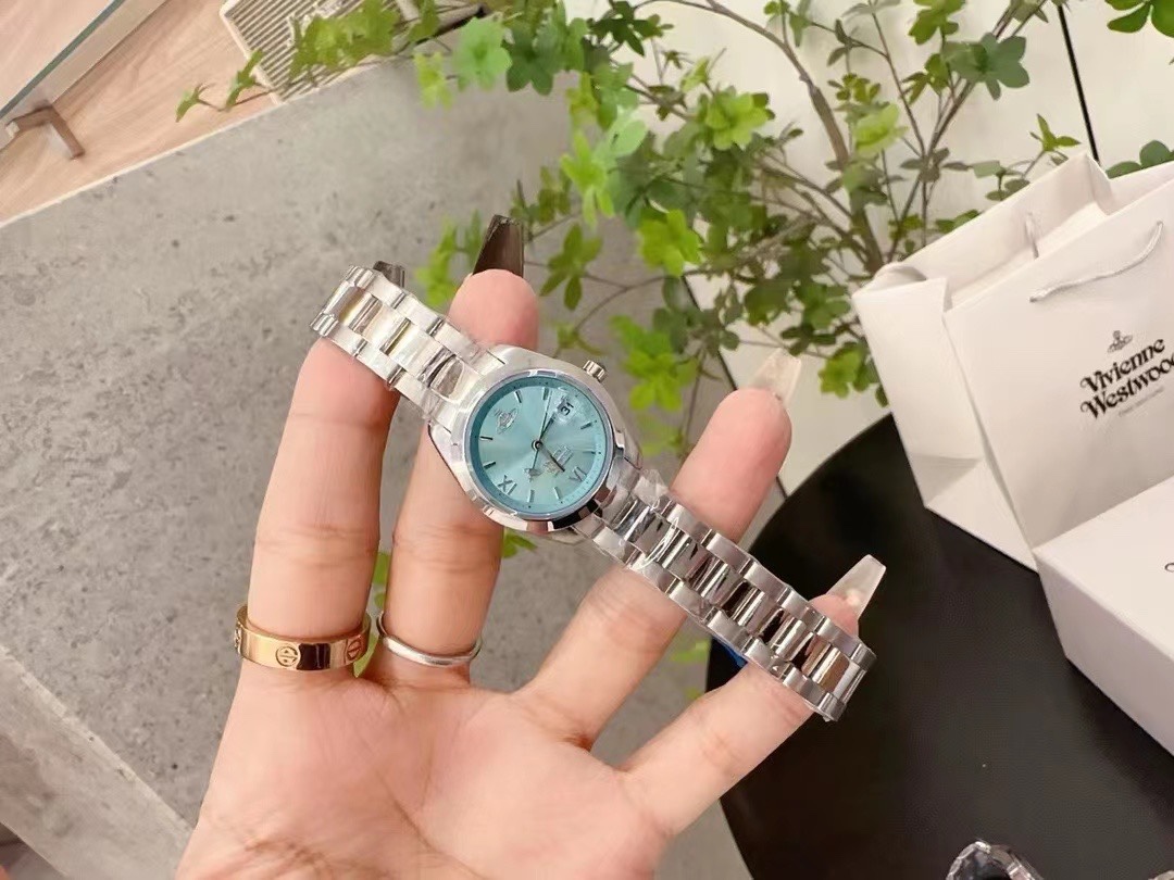 Replica Vivienne Westwood Light Blue Dial Silver Band Saturn Watch - 28MM