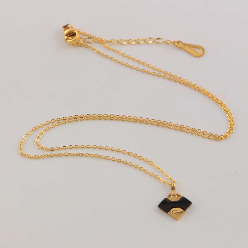 Replica Cartier Rhombus Black and White Shell Alphabet Necklace