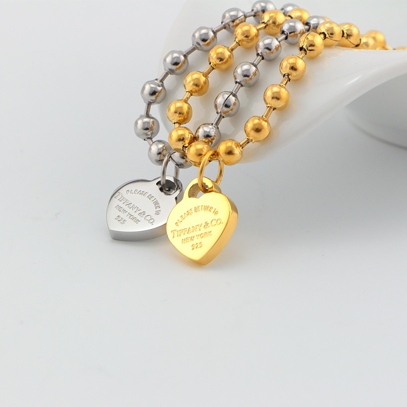 Replica Tiffany heart pendant bead bracelet plated with 18k rose gold European and American bracelet for girls