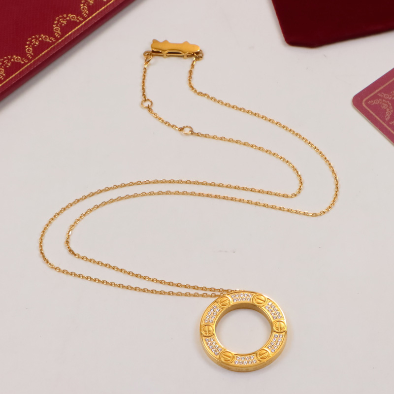 Replica Cartier new alphabet large round cake full diamond pendant necklace