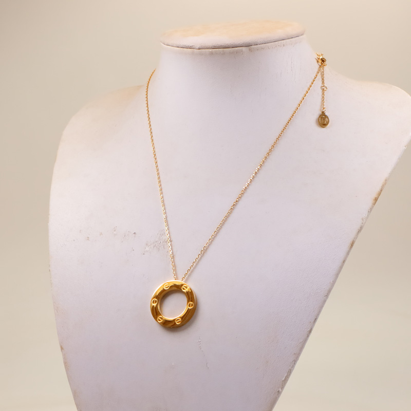 Replica Cartier new diamond-free letter large round cake pendant necklace