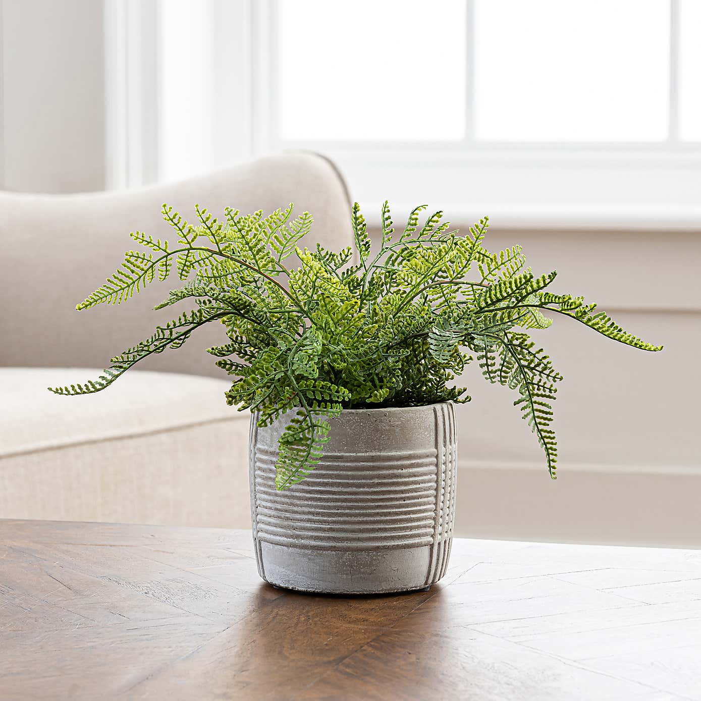 Artificial Green Fern in Grey Concrete Pot