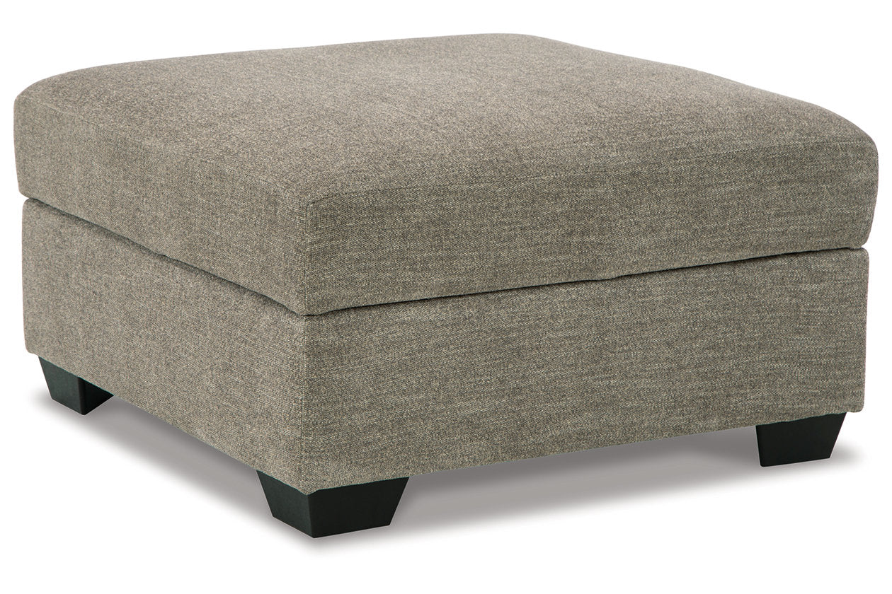Ashley Furniture Creswell Fabric Ottoman with Storage in Gray & Black