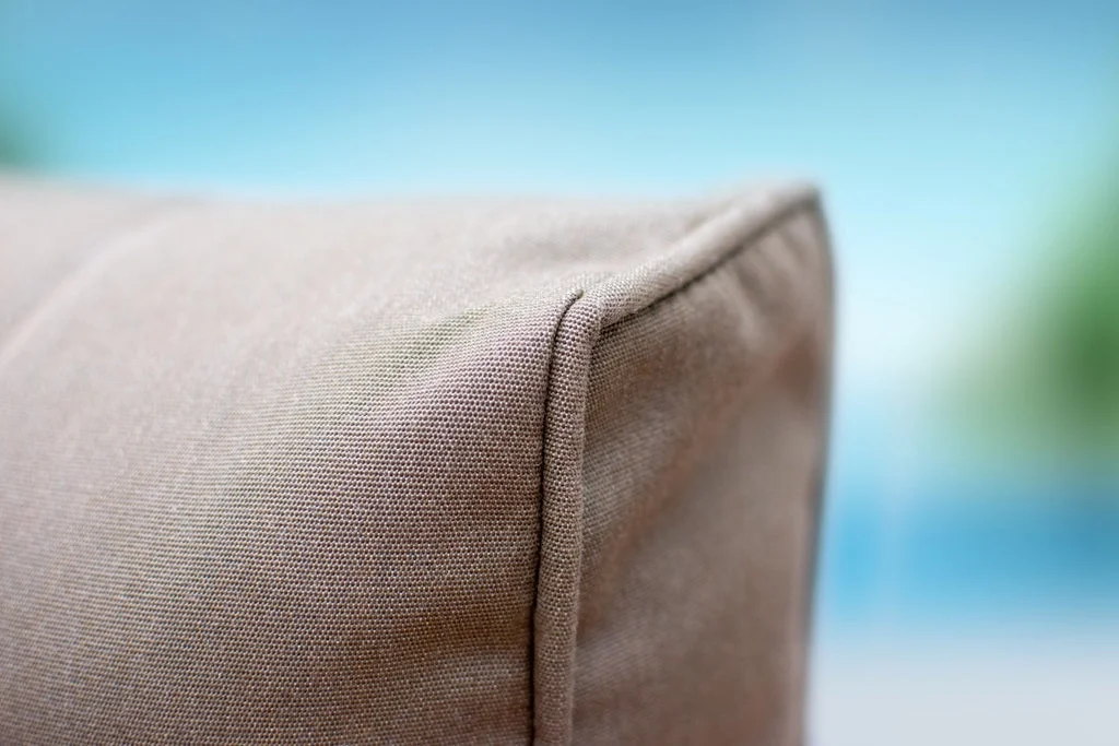 Sorrento 7-Piece Resin Wicker Outdoor Patio Furniture Sectional Sofa Set in Gray w/ Four Sectional Pieces, Ottoman, Armchair, and Coffee Table (Flat-Weave Gray Wicker, Sunbrella Canvas Taupe)