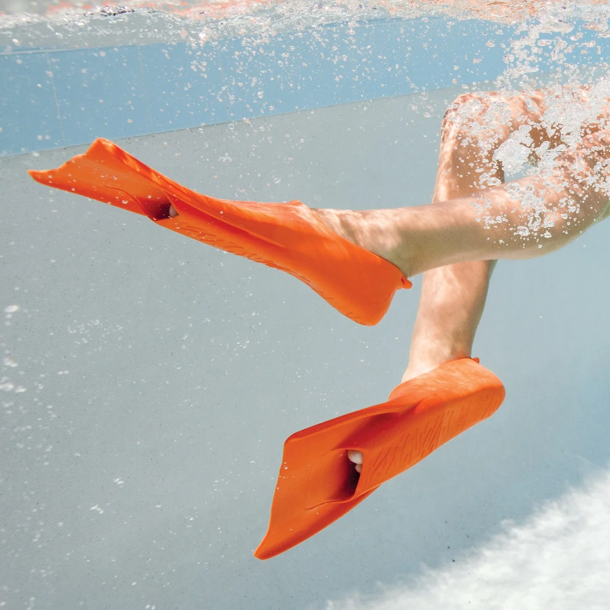 FINIS Booster Fins - High-Quality Swim Fins for Kids Ages 8?11 - Swimming Fins to Improve Body Position and Kicking Technique - High-Quality Pool Accessories and Swim Gear - Orange