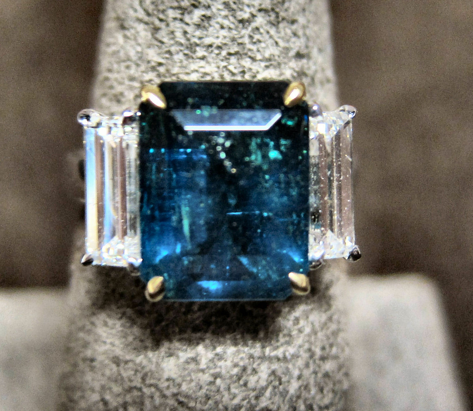 rectangular emerald 4.00 cttw diamond two emerald shape side diamond set ring