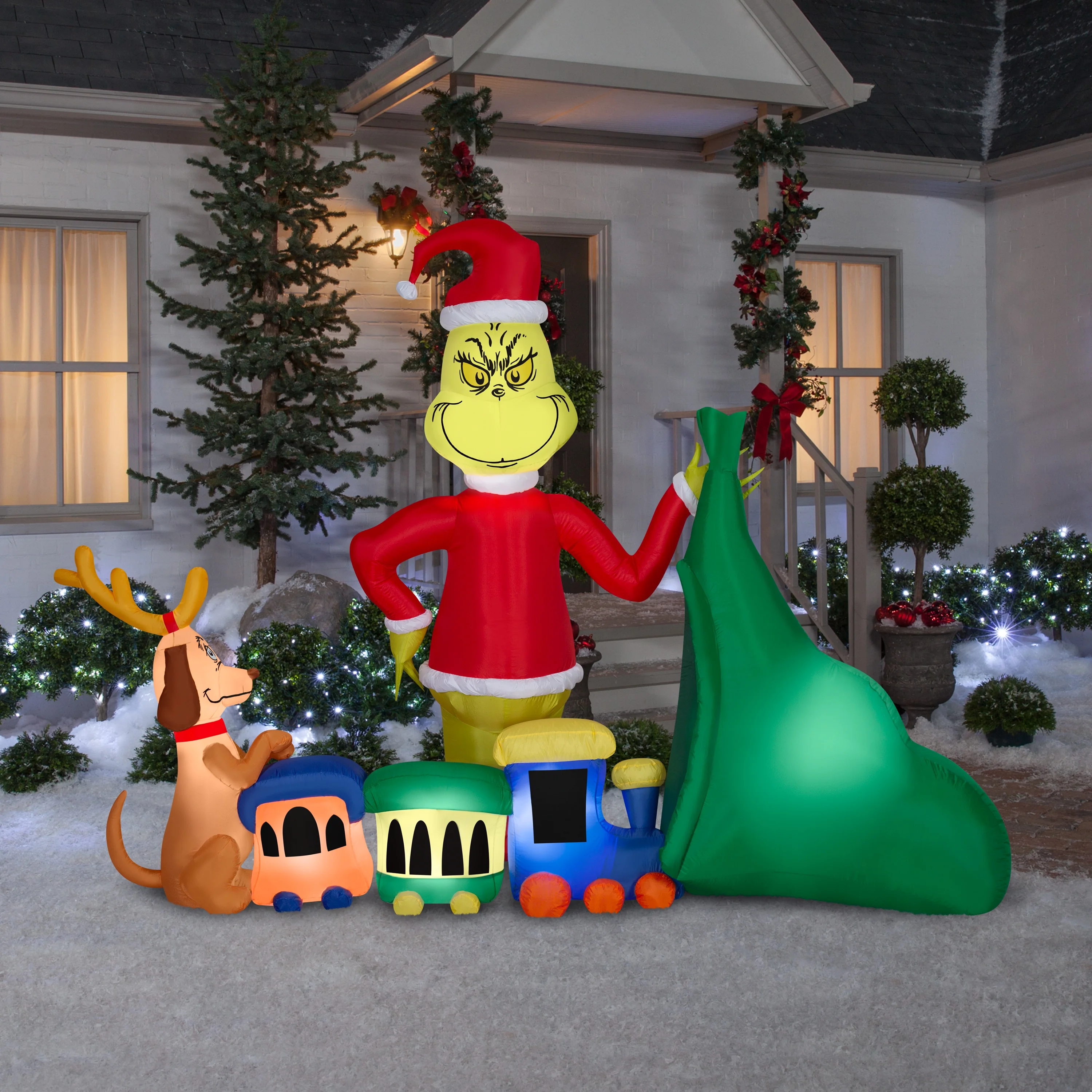 Gemmy Christmas Airblown Inflatable Grinch Putting Train in Santa Sack Scene Dr. Seuss, 6.5 ft Tall